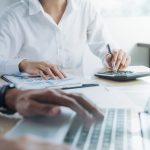 14 Spending Triggers That Hurt Your Budget Business team present. Professional investor working new startup